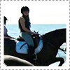 Exclusive Candid Photo; Mack on her old horse Mentos Junior at Morro Bay on the beach side.