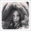 EXCLUSIVE: Mackenzie Rosman Sporting Her Hooded Faux Fur Coat for LAs Rainy Weather in early December 2014.