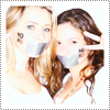 Mack & Beverley Mitchell posing in their NOH8 Campaign Photo Shoot in February 2012.