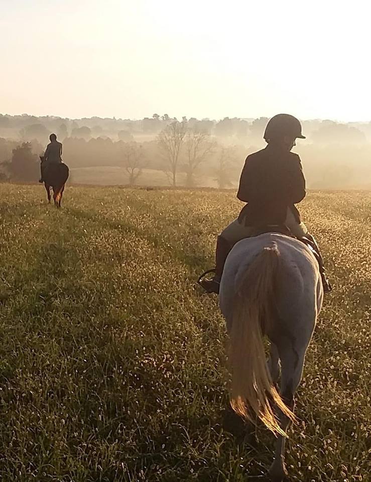 Mackenzie Rosman taking a early morning ride and watching the sunset in October 2018.
