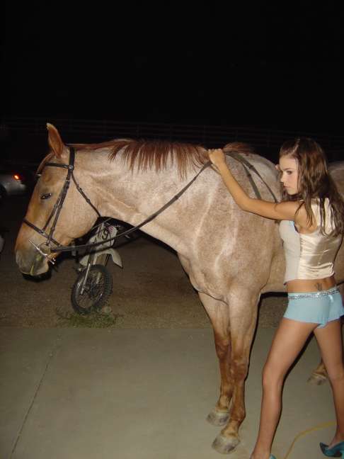 Tribute: In Memory of Katelyn Salmont - Katelyn Taking a horse out of it's stable
Keywords: kat167