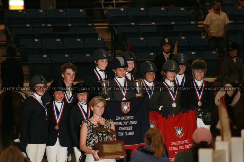 Mack Posing With Fellow Show-Jumping Team After Winning 1st Place in a Championship Competition
Keywords: showjumpcomp
