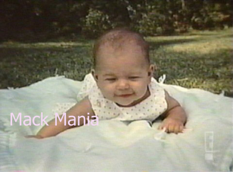 Mack as a baby on a blanket in the park - Copyright Mack Mania
